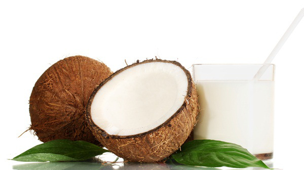 Coconut milk and coconut isolated on white